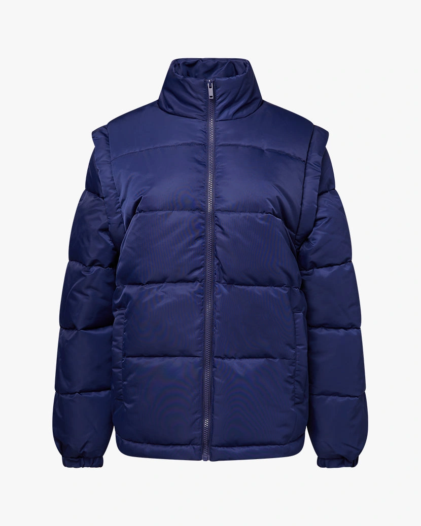 Veste puffer manches amovibles: Élégance modulable pour aventures urbaines ou escapades hivernales !